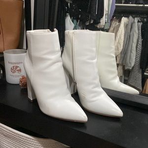 White faux leather pointed toe black heeled booties